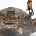 Tetera japonesa de cerámica marrón con mango efecto bronce